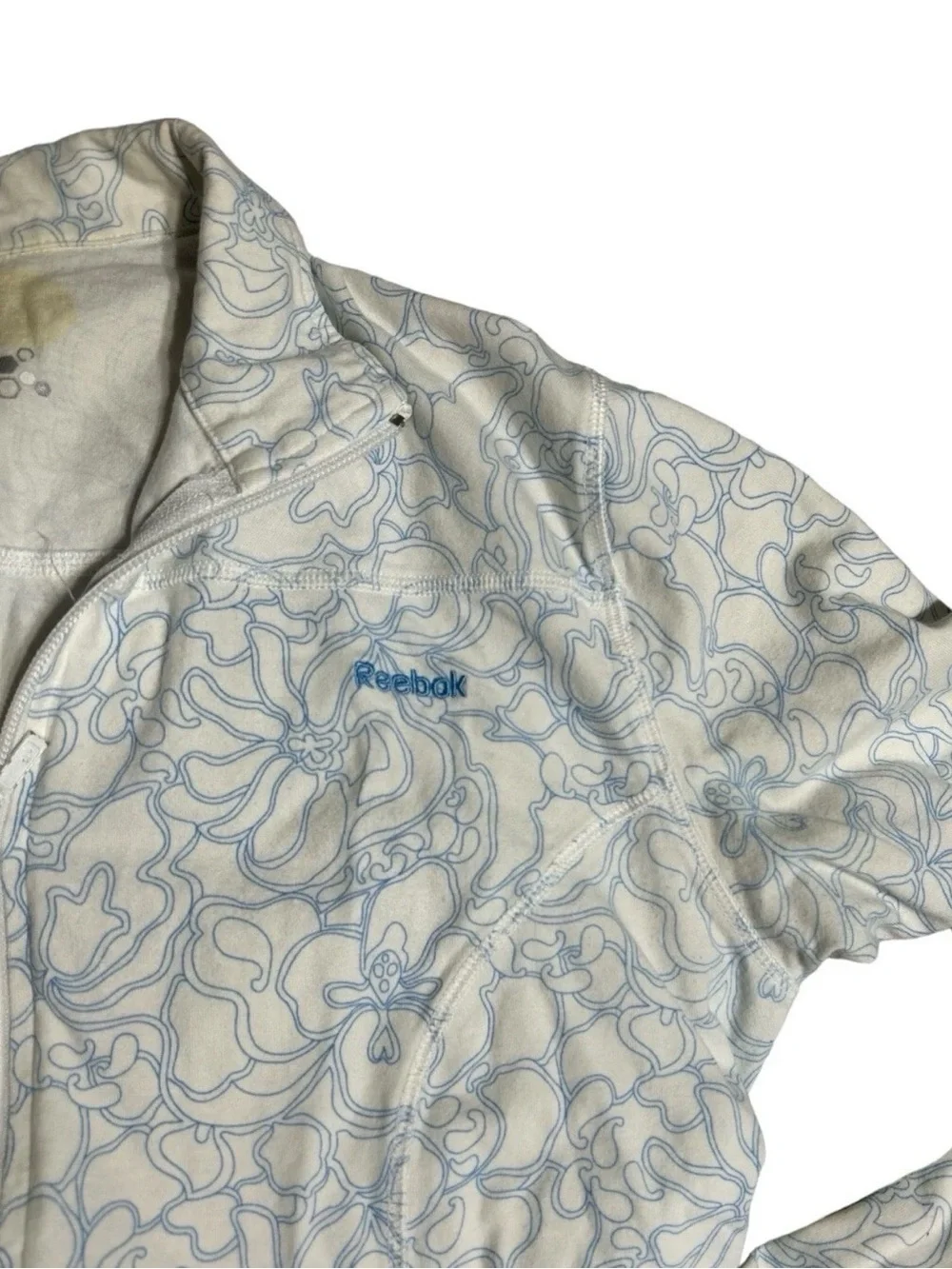 Reebok Women's White Jacket with Light Blue Floral Outline
